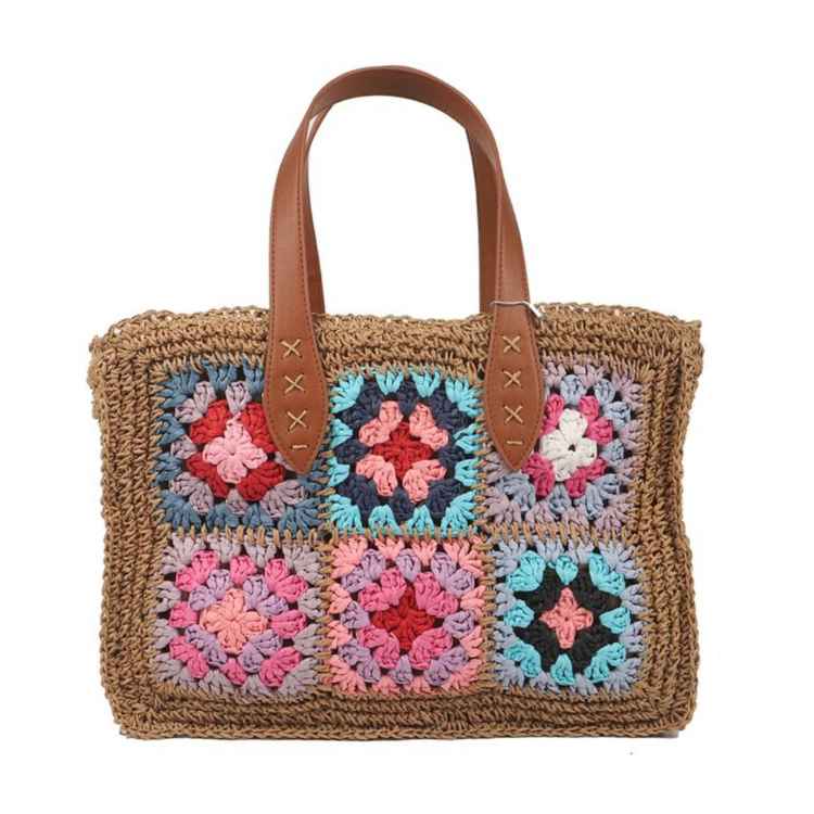 Bolso hilo vegetal con flores tonos rosa